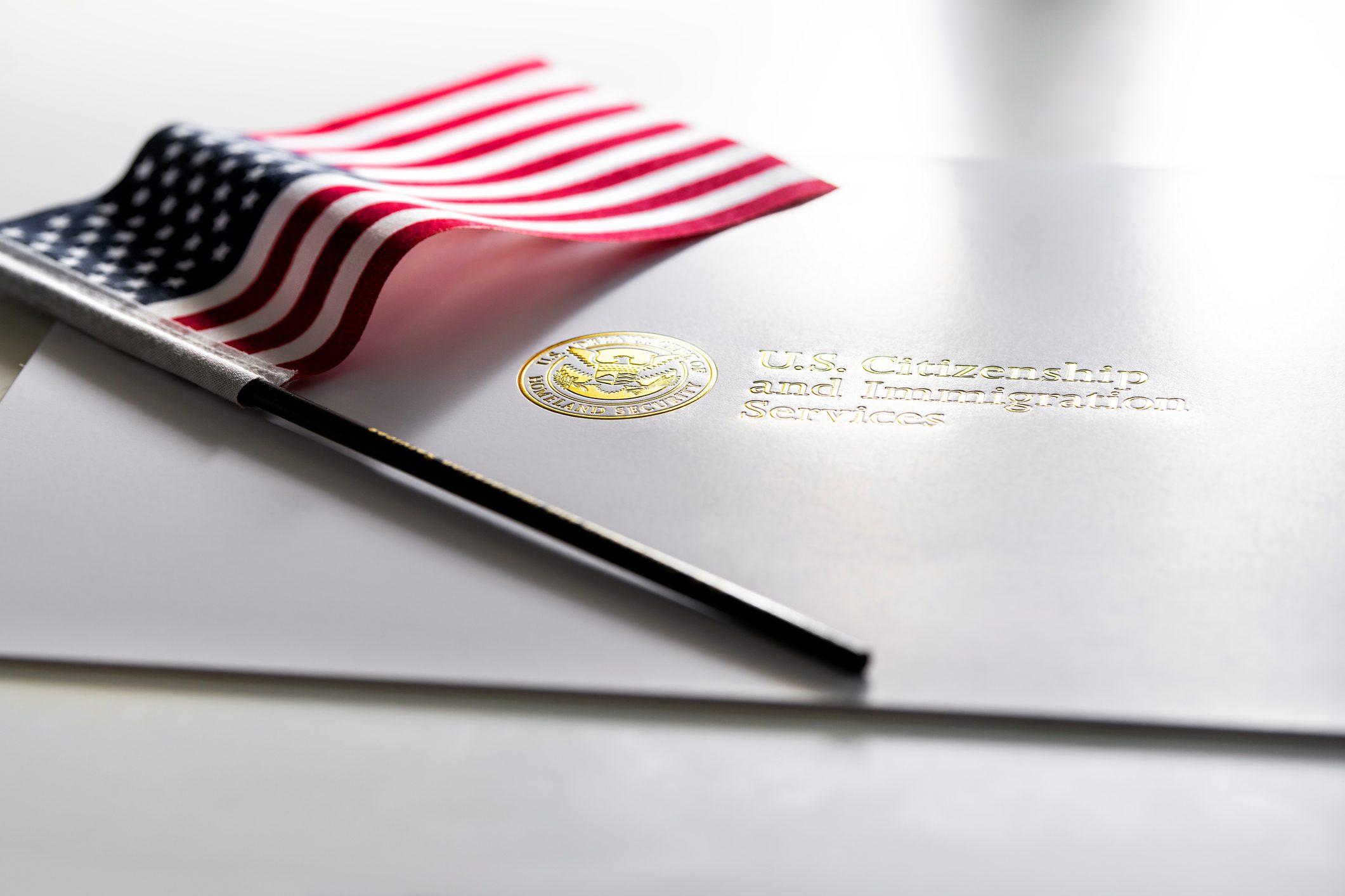U.S. flag and document with seal