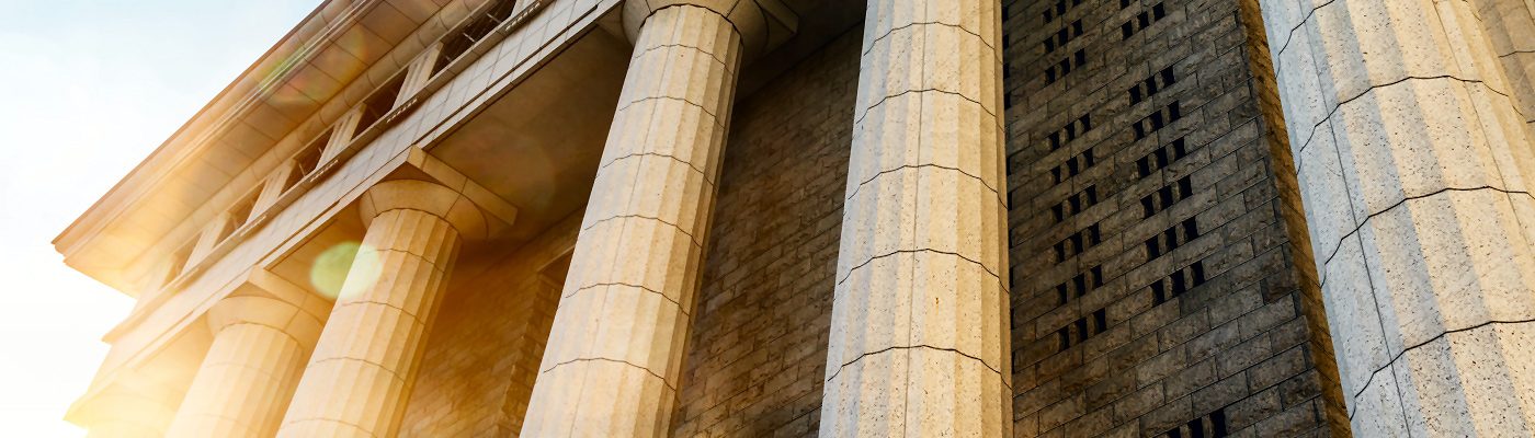Majestic pillars against a bright sky