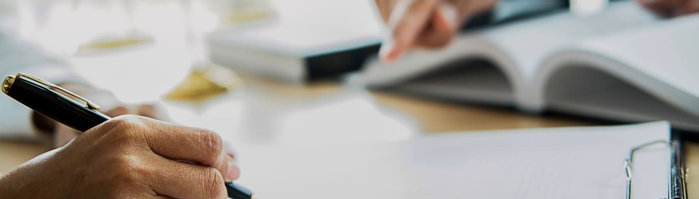 Close-up of writing in a meeting